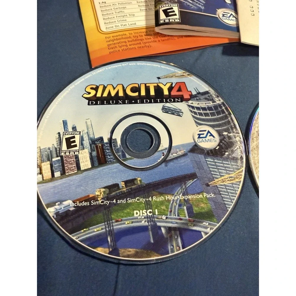 SIM CITY 4: Deluxe Edition (PC Game CD-ROM, 2003) 2 Discs with Manual in Case.